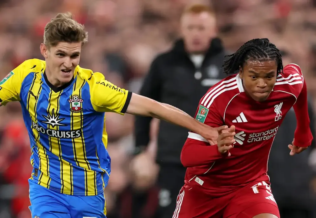 Rio Ngumoha runs with the ball for Liverpool and holds off Southampton's Elias Jelert