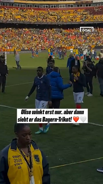 Olise walking past France fans asking for an autograph until he sees the Bayern jersey