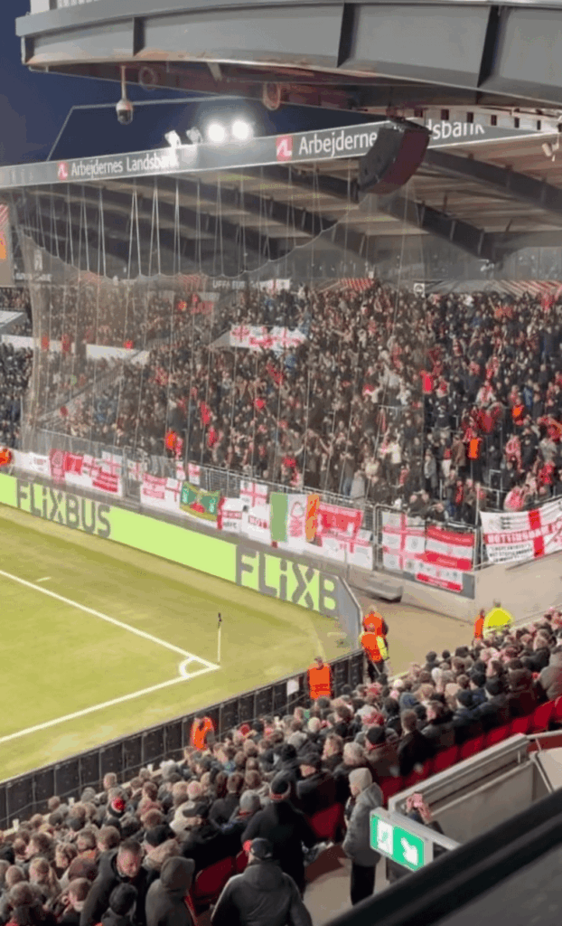 Forest fan tumbles over fence of away-end in Denmark during goal celebrations against Midtjylland