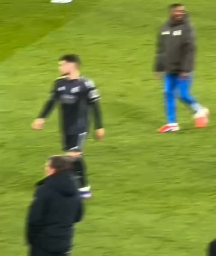 Trent explaining to Alaba how to handle Doku's movements after the final whistle.