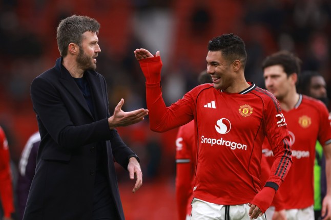 MANCHESTER, ENGLAND - MARCH 15: Michael Carrick manager / head coach of Manchester United with Casemiro of Manchester United af the Premier League match between Manchester United and Aston Villa at Old Trafford on March 15, 2026 in Manchester, England. (Photo by Catherine Ivill - AMA/Getty Images)