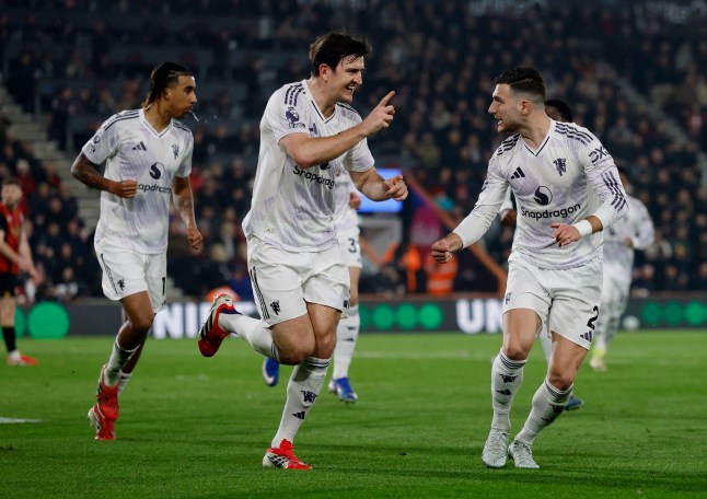 Soccer Football - Premier League - AFC Bournemouth v Manchester United - Vitality Stadium, Bournemouth, Britain - March 20, 2026 Manchester United's Harry Maguire and Diogo Dalot celebrate their second goal, an own goal scored by AFC Bournemouth's James Hill Action Images via Reuters/Andrew Couldridge EDITORIAL USE ONLY. NO USE WITH UNAUTHORIZED AUDIO, VIDEO, DATA, FIXTURE LISTS, CLUB/LEAGUE LOGOS OR 'LIVE' SERVICES. ONLINE IN-MATCH USE LIMITED TO 120 IMAGES, NO VIDEO EMULATION. NO USE IN BETTING, GAMES OR SINGLE CLUB/LEAGUE/PLAYER PUBLICATIONS. PLEASE CONTACT YOUR ACCOUNT REPRESENTATIVE FOR FURTHER DETAILS..
