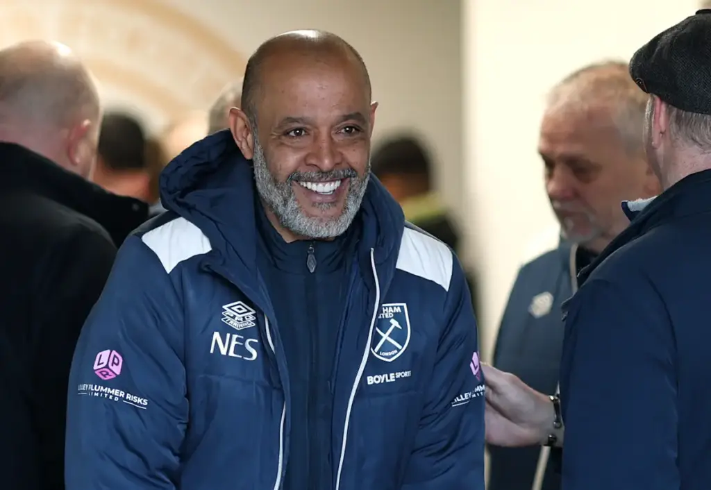 Nuno Espirito Santo smiles while in the tunnel before a West Ham match