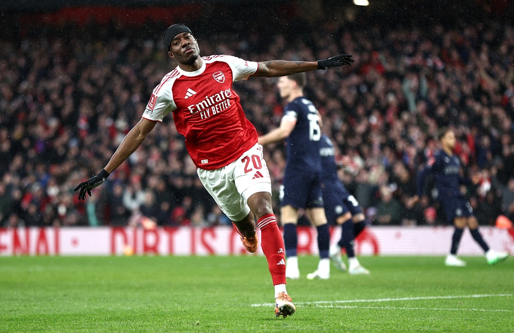 Noni Madueke of Arsenal celebrates scoring his team's first goal during the Emirates FA Cup Fourth Round match between Arsenal and Wigan Athletic on February 15, 2026 in London, England. (Photo by James Fearn/Getty Images)