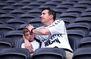 A dad consoling his crying son in an empty stadium today. Says it all really. This club means everything to us fans. Wish the players, ownership, and execs felt even half of it.