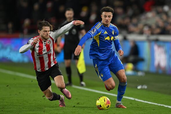 Mathias Jensen of Brentford and Ethan Ampadu of Leeds