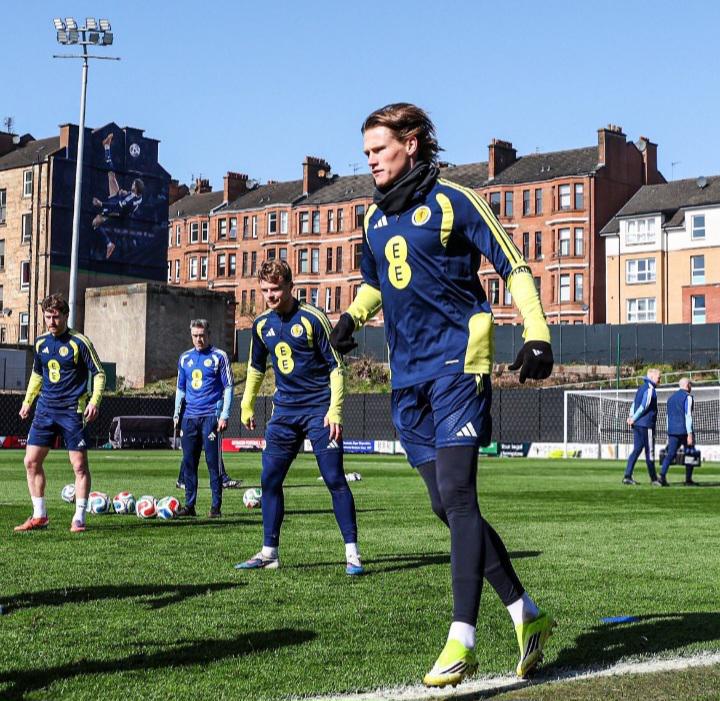 Scott McTominay with his own mural in the background