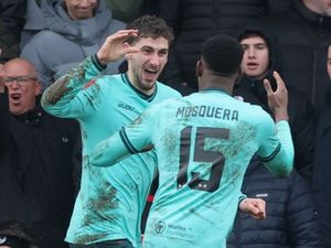 Santiago Bueno (left) celebrates after scoring Wolves' winner