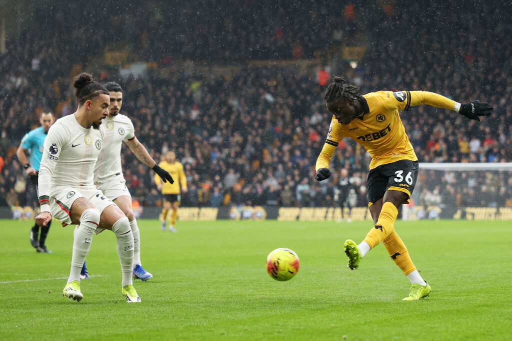 Brentford's Michael Kayode (left) and Wolverhampton Wanderers' Mateus Mane battle for the ball during the Premier League match at the Gtech Community Stadium on Monday