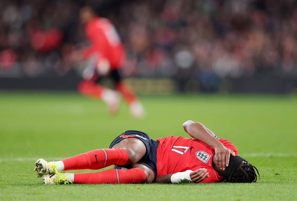 Noni Madueke of England reacts on the floor, which results in him being substituted due to a injury during the international friendly match between England and Uruguay at Wembley Stadium on March 27, 2026 in London, England. (Photo by Julian Finney/Getty Images)