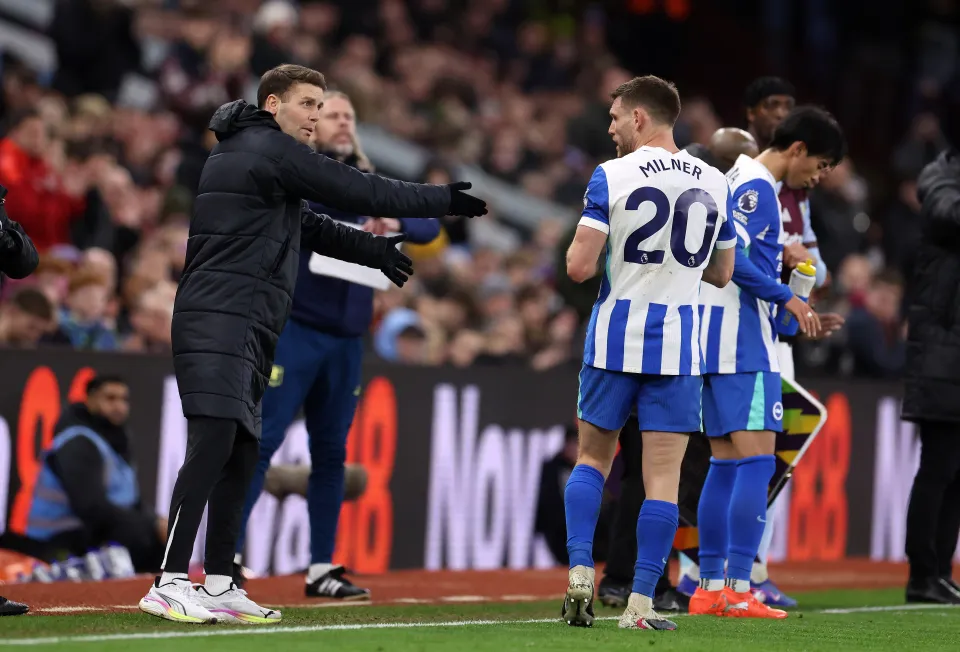 Fabian Hurzeler head coach of Brighton and Hove Albion interacts with James Milner of Brighton and Hove Albion during the Premier League match between Aston Villa and Brighton & Hove Albion