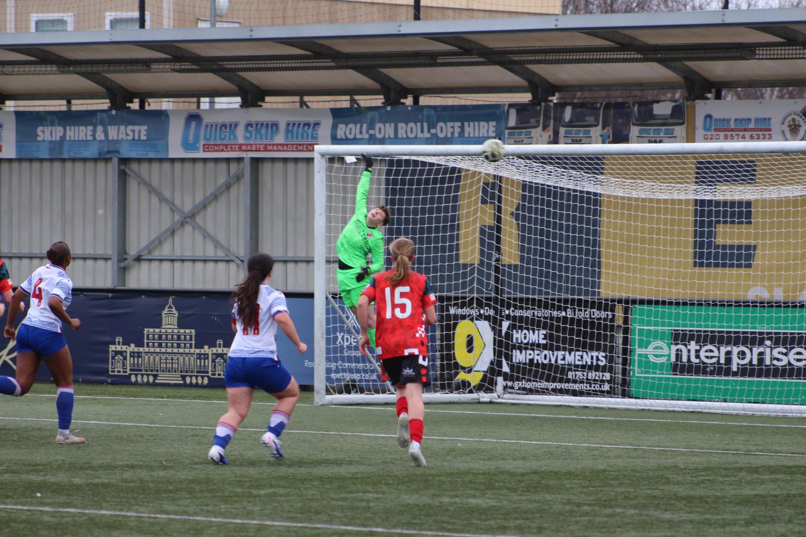 Sophie Butler tips a shot onto the crossbar just before half-time to keep the scores level