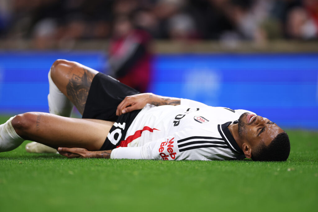 LONDON, ENGLAND - DECEMBER 05: Reiss Nelson of Fulham goes down with an injury during the Premier League match between Fulham FC and Brighton & Hove Albion FC at Craven Cottage on December 05, 2024 in London, England. (Photo by Ryan Pierse/Getty Images)