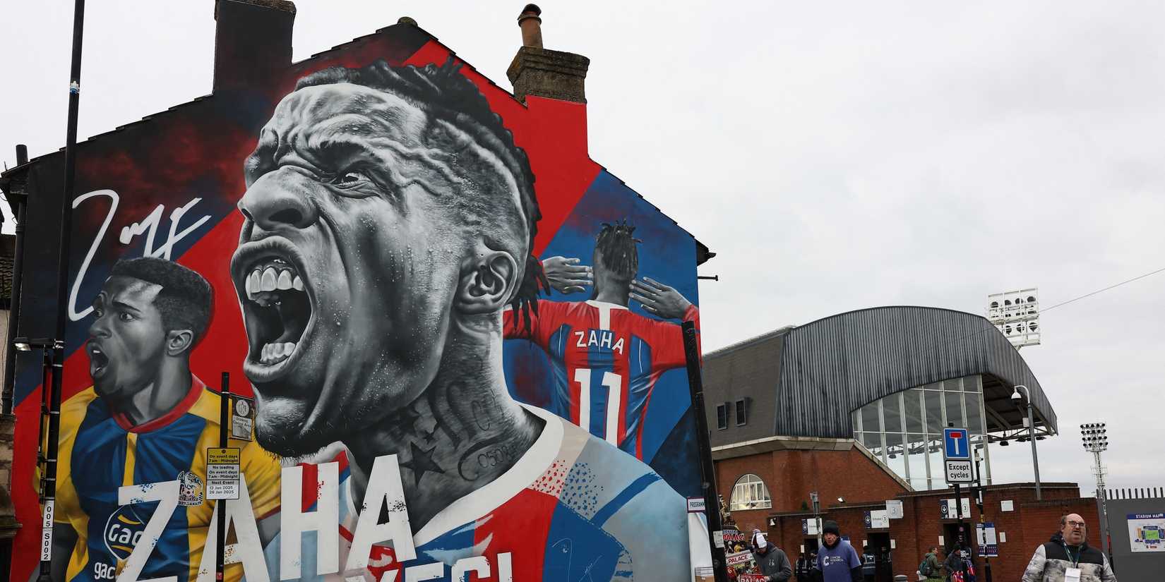 General view of a mural of former Crystal Palace player Wilfried Zaha outside the stadium