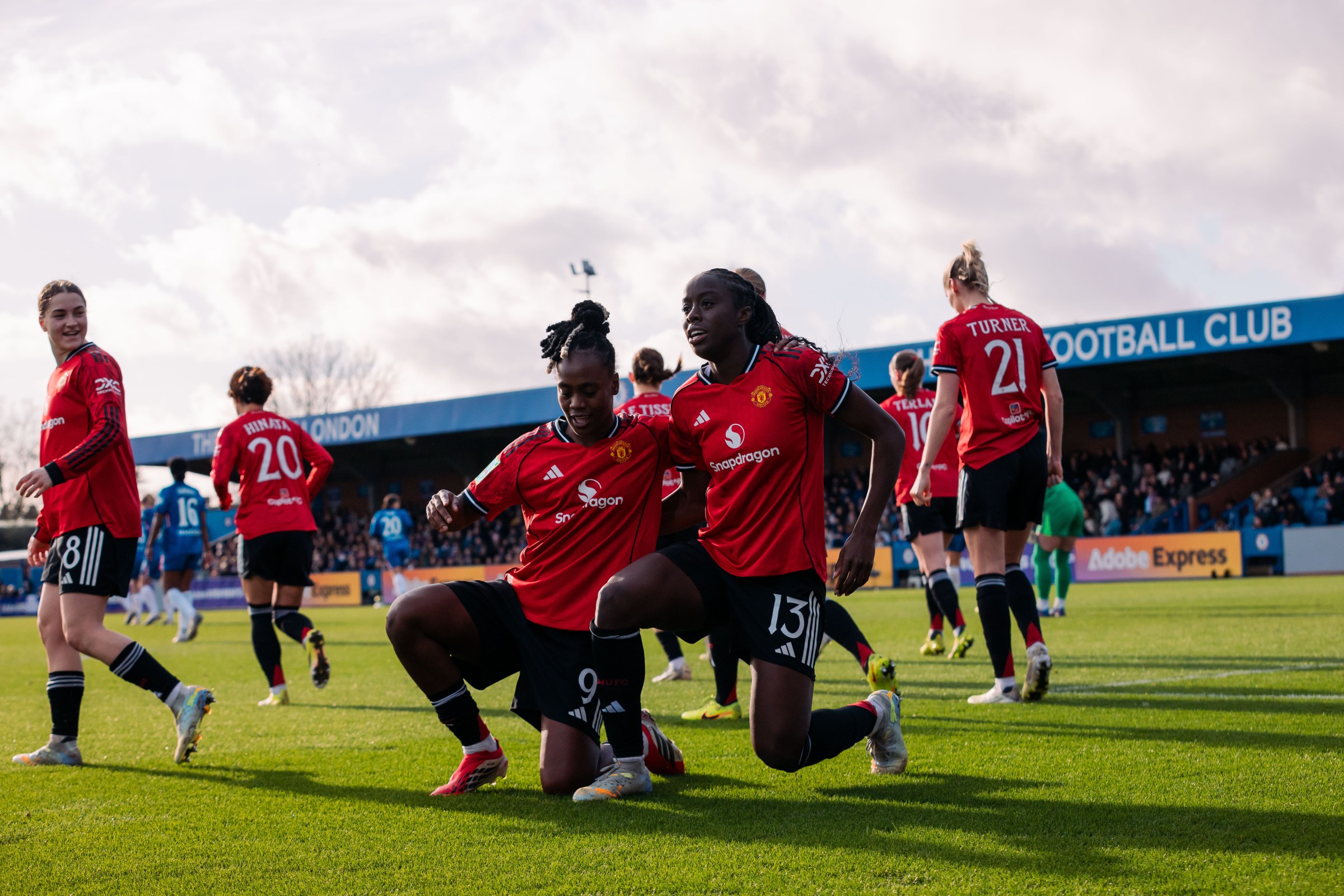 KINGSTON UPON THAMES, ENGLAND - FEBRUARY 22: Simi Awujo of Manchester United celebrates scoring her teams first goal with Melvine Malard during the Adobe Women’s FA Cup Fifth Round match between Chelsea and Manchester United at Kingsmeadow on February 22, 2026 in Kingston upon Thames, England. (Photo by Poppy Townson - MUFC/Manchester United via Getty Images)