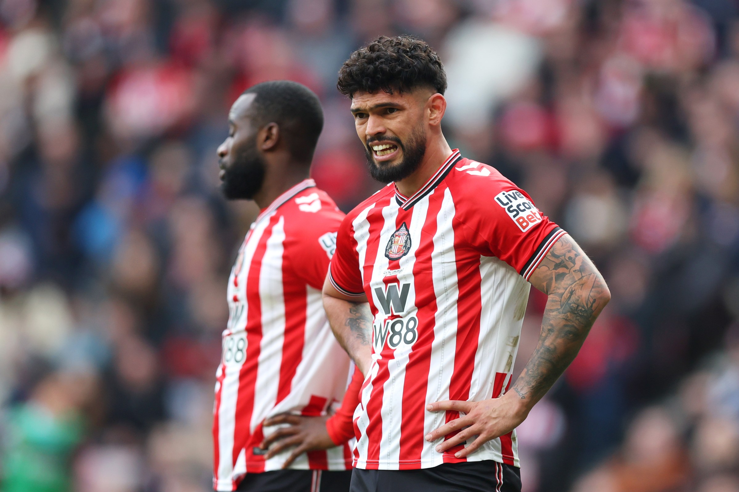 SUNDERLAND, ENGLAND - MARCH 14: Omar Alderete of Sunderland looks dejected after his side concedes a goal scored by Yankuba Minteh of Brighton & Hove Albion (not pictured) during the Premier League match between Sunderland and Brighton & Hove Albion at Stadium of Light on March 14, 2026 in Sunderland, England. (Photo by George Wood/Getty Images)
