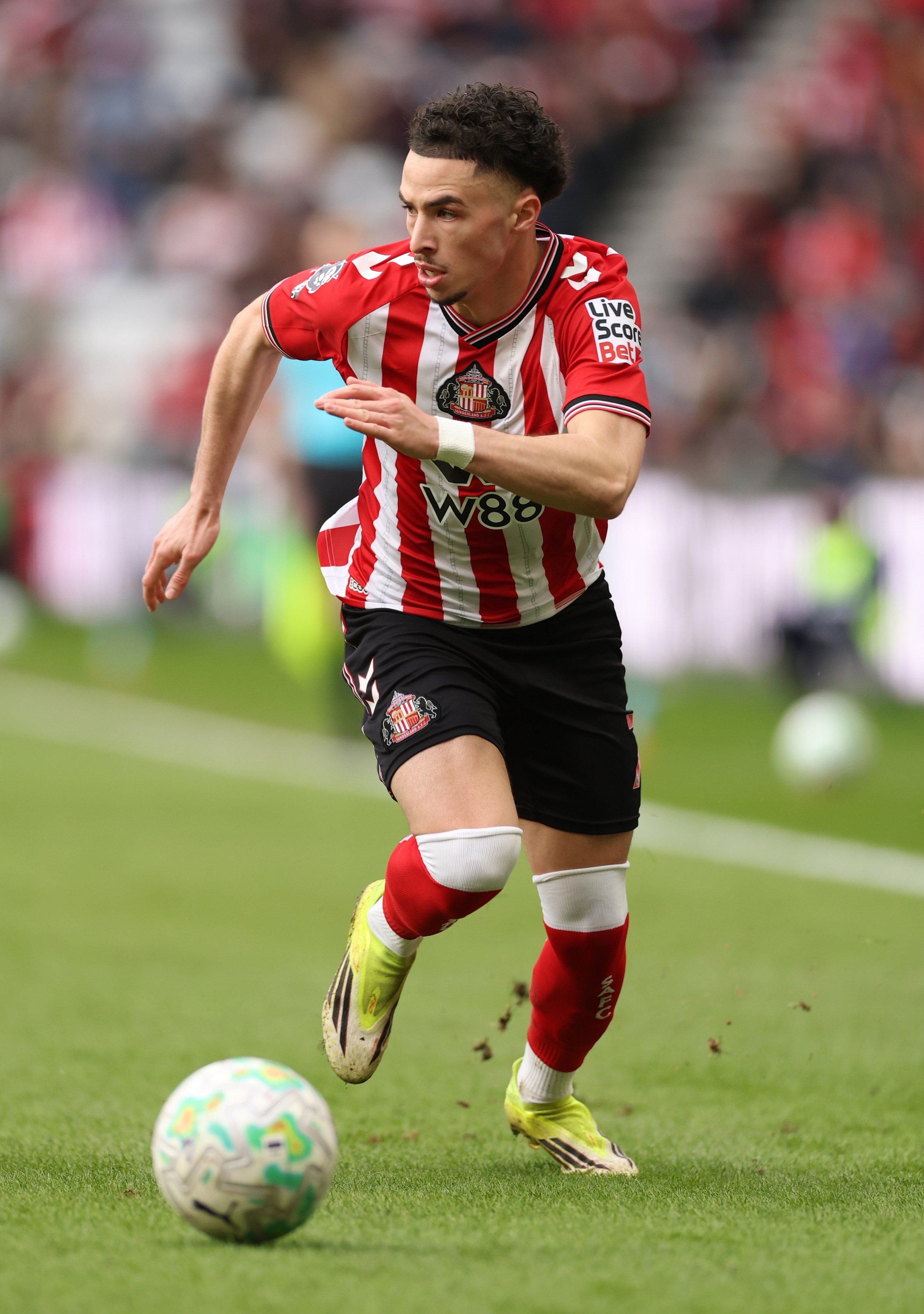 SUNDERLAND, ENGLAND - MARCH 14: Chemsdine Talbi of Sunderland in action during the Premier League match between Sunderland and Brighton & Hove Albion at Stadium of Light on March 14, 2026 in Sunderland, England. (Photo by Stu Forster/Getty Images)