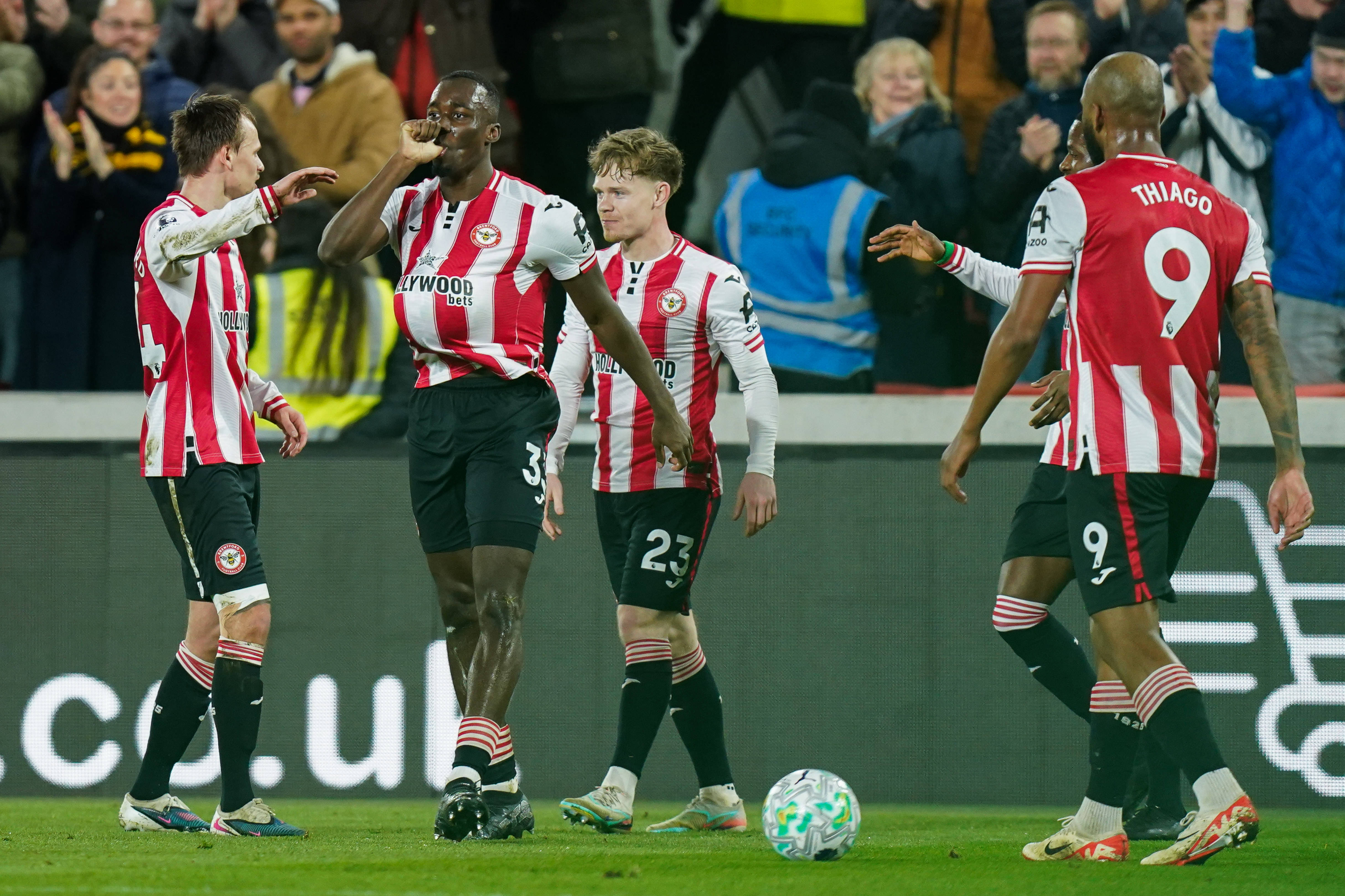 Michael Kayode of Brentford celebrating his goal to make it 1-0 during the Brentford v Wolverhampton Wanderers Premier League match at the Gtech Community Stadium, London, England