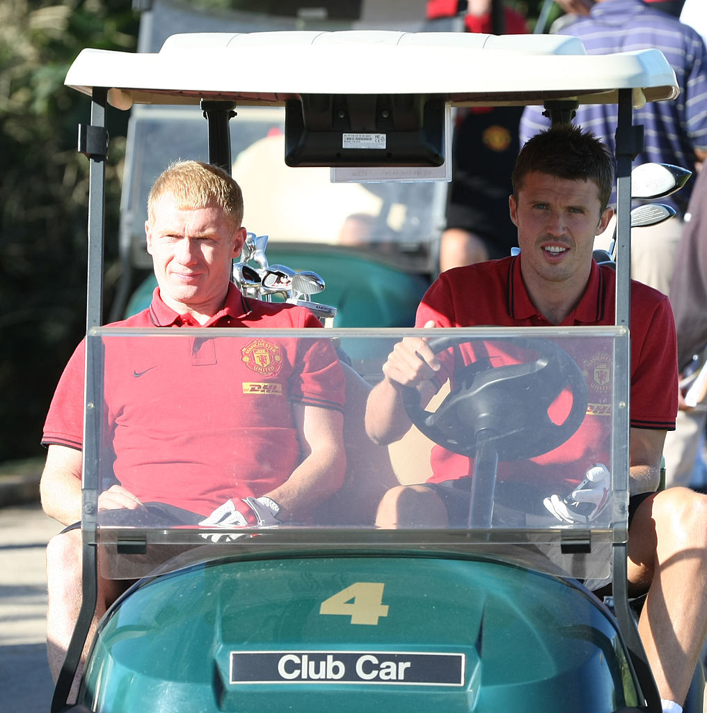 DURBAN, SOUTH AFRICA - JULY 19: (EXCLUSIVE COVERAGE) Paul Scholes (L) and Michael Carrick of Manchester United plays golf during the club's pre-season tour of South Africa on July 19, 2012 in Durban, South Africa. (Photo by John Peters/Manchester United via Getty Images)