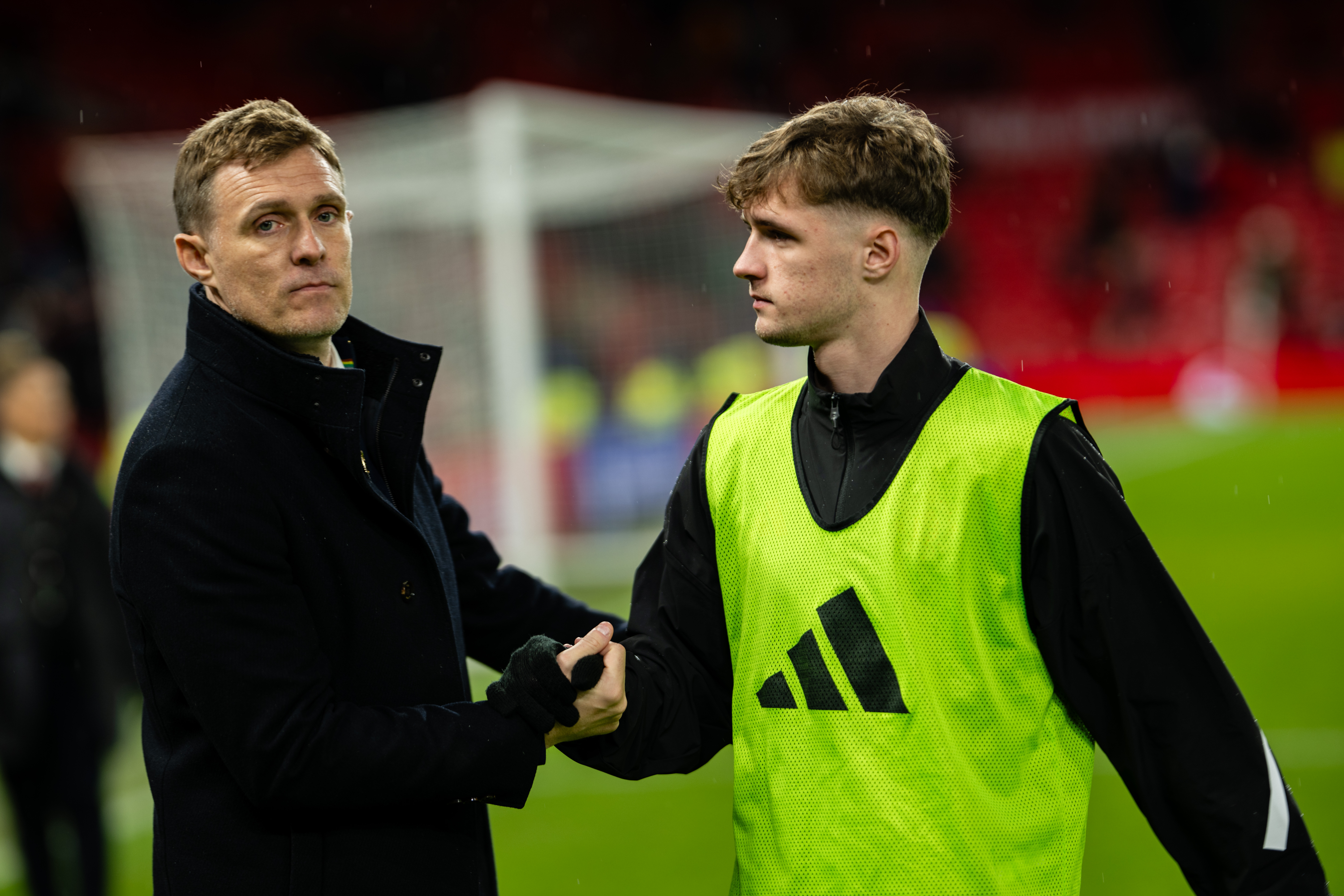 MANCHESTER, ENGLAND - JANUARY 11: Darren Fletcher, Interim Manager at Manchester United interacts with Jack Fletcher of Manchester United following the Emirates FA Cup Third Round match between Manchester United and Brighton & Hove Albion on January 11, 2026 in Manchester, England. (Photo by Ash Donelon/Manchester United via Getty Images)