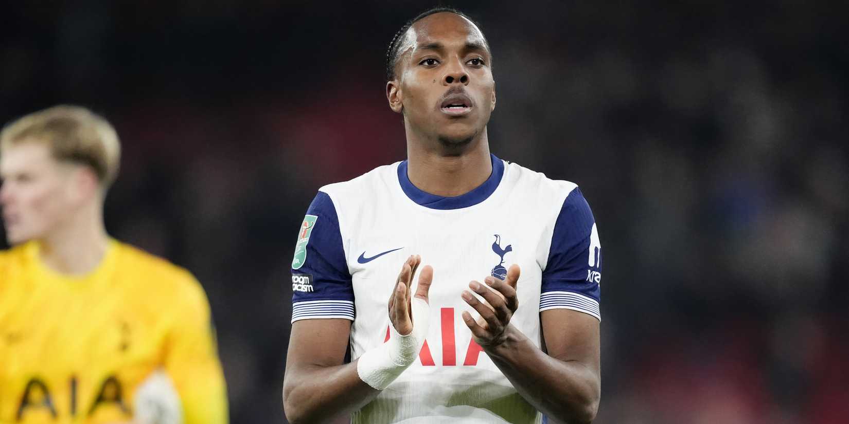 Mathys Tel applauding the Tottenham Hotspur supporters