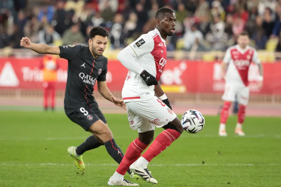 Paul Pogba of Monaco, left Goncalo Ramos of PSG during the Ligue 1 McDonald's football match between AS Monaco (ASM) and Paris Saint-Germain (PSG) at Stade Louis II