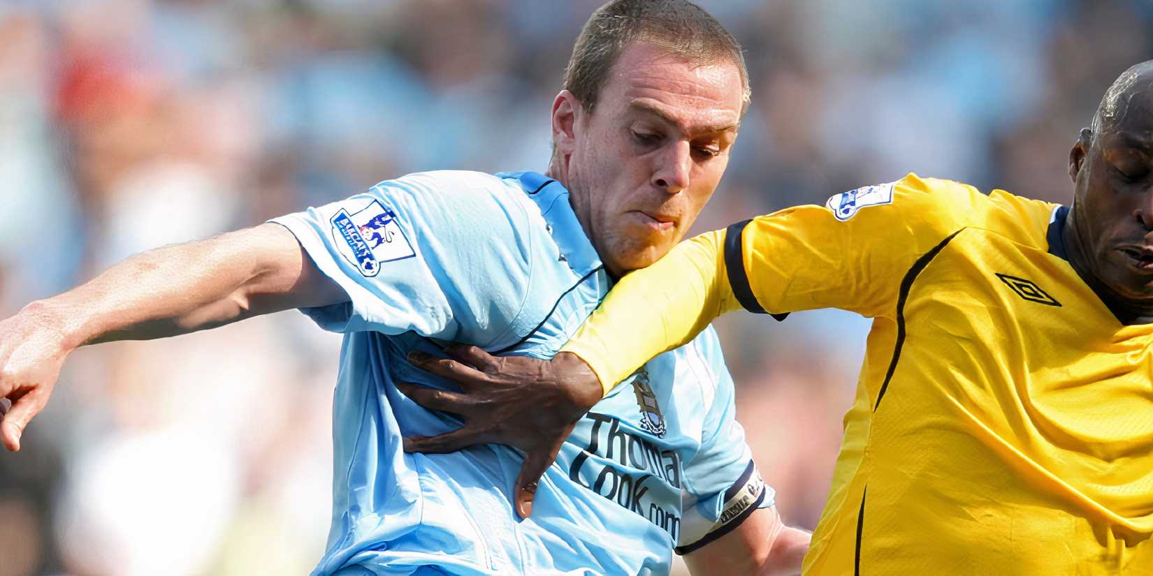 Richard Dunne battling for the ball 2