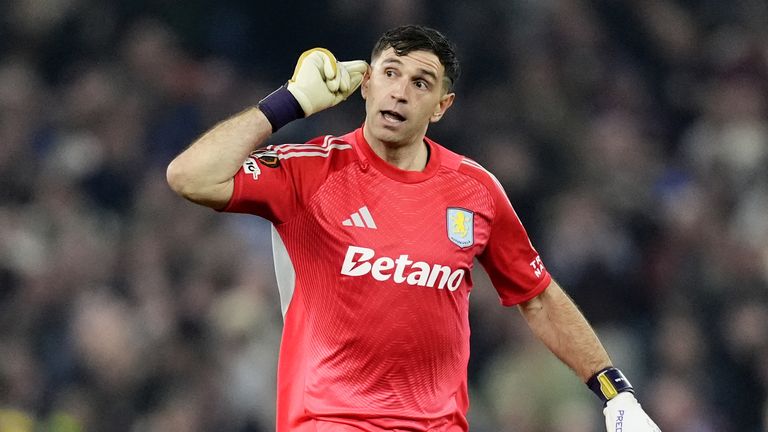 Emiliano Martinez celebrates Aston Villa's opening goal against Lille