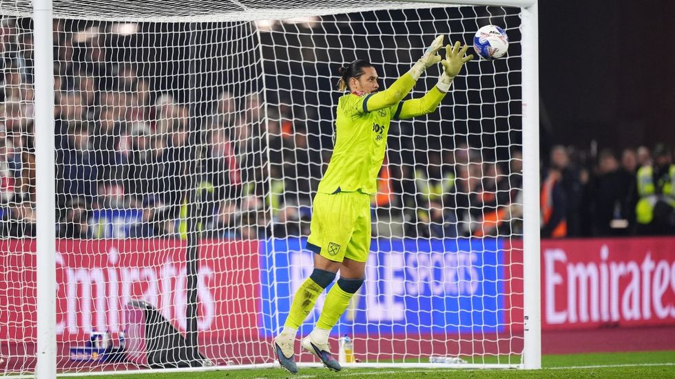 West Ham goalkeeper Alphonse Areola saves penalty
