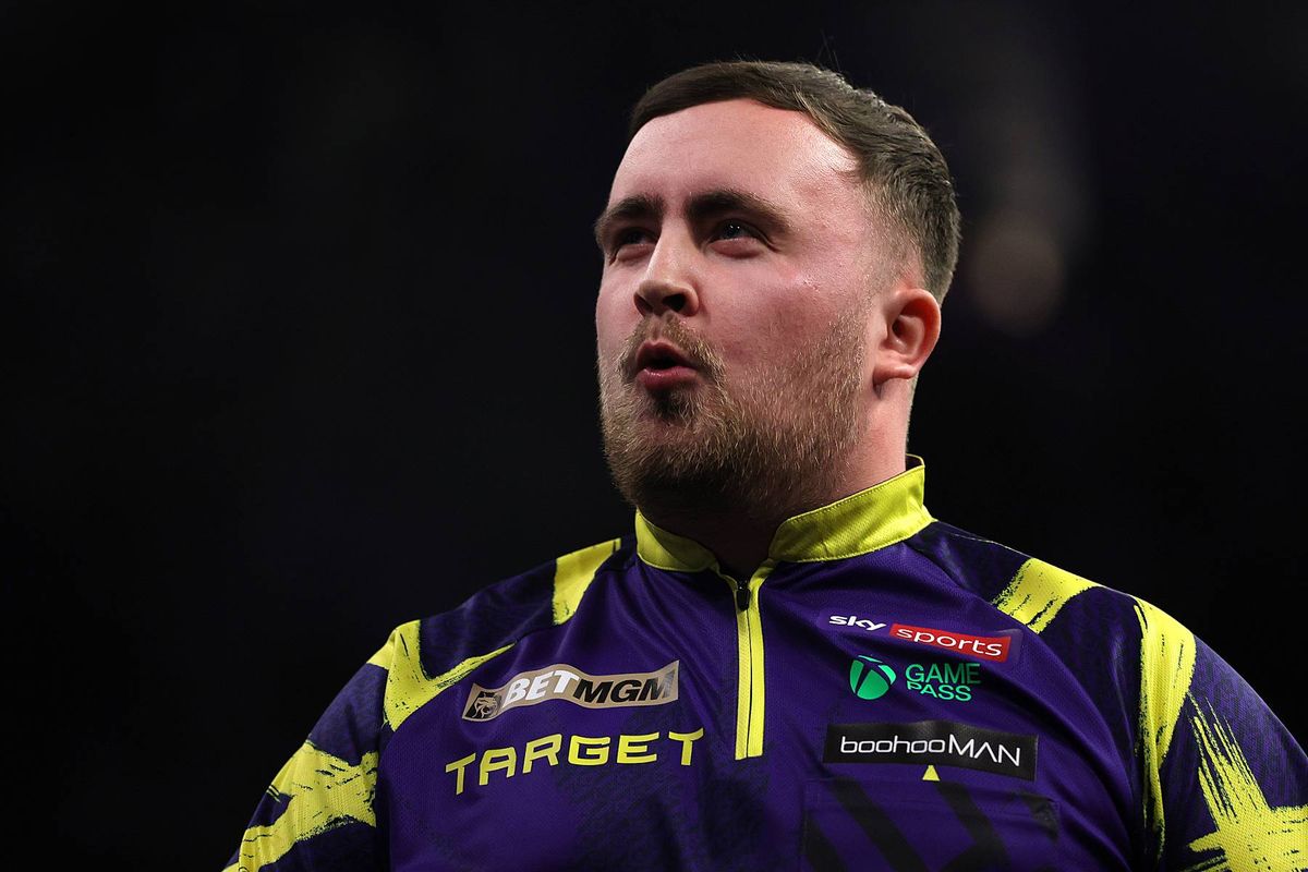 Luke Littler reacts following his quarter final match against Gian Van Veen at AO Arena