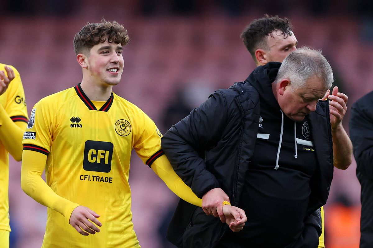 BOURNEMOUTH, ENGLAND - MARCH 09: Chris Wilder, Manager of Sheffield United, interacts with Oliver Luke Arblaster of Sheffield United  during the Premier League match between AFC Bournemouth and Sheffield United at Vitality Stadium on March 09, 2024 in Bournemouth, England. (Photo by Michael Steele/Getty Images)