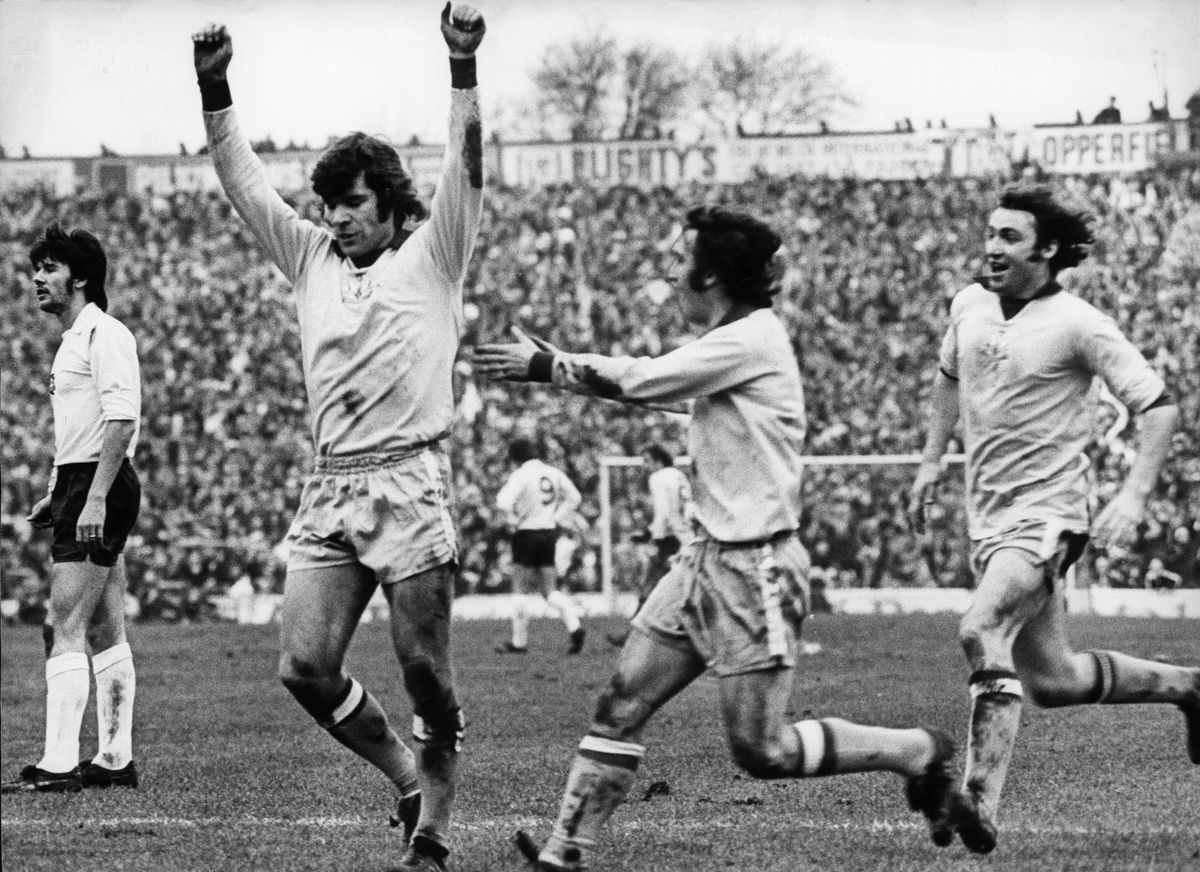 Malcolm Macdonald celebrates his FA Cup wonder goal against Bolton Wanderers in the 3-3 draw at Burnden Park, February 1976