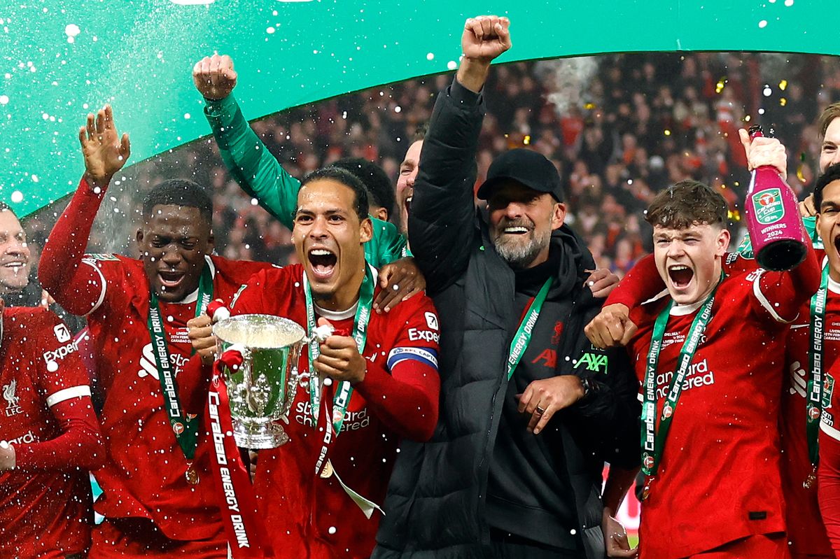 Virgil van Dijk of Liverpool and Jurgen Klopp, Manager of Liverpool celebrate with trophy after winning the Carabao Cup Final  after the match between Chelsea and Liverpool at Wembley Stadium