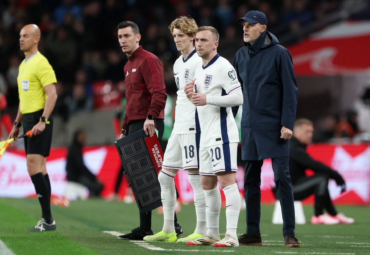 LONDON, ENGLAND - MARCH 21: Thomas Tuchel, Head Coach of England, interacts with Anthony Gordon and Jarrod Bowen of England as they prepare to be substituted during the FIFA World Cup 2026 European Qualifier between England and Albania at Wembley Stadium on March 21, 2025 in London, England. (Photo by Eddie Keogh - The FA/The FA via Getty Images)