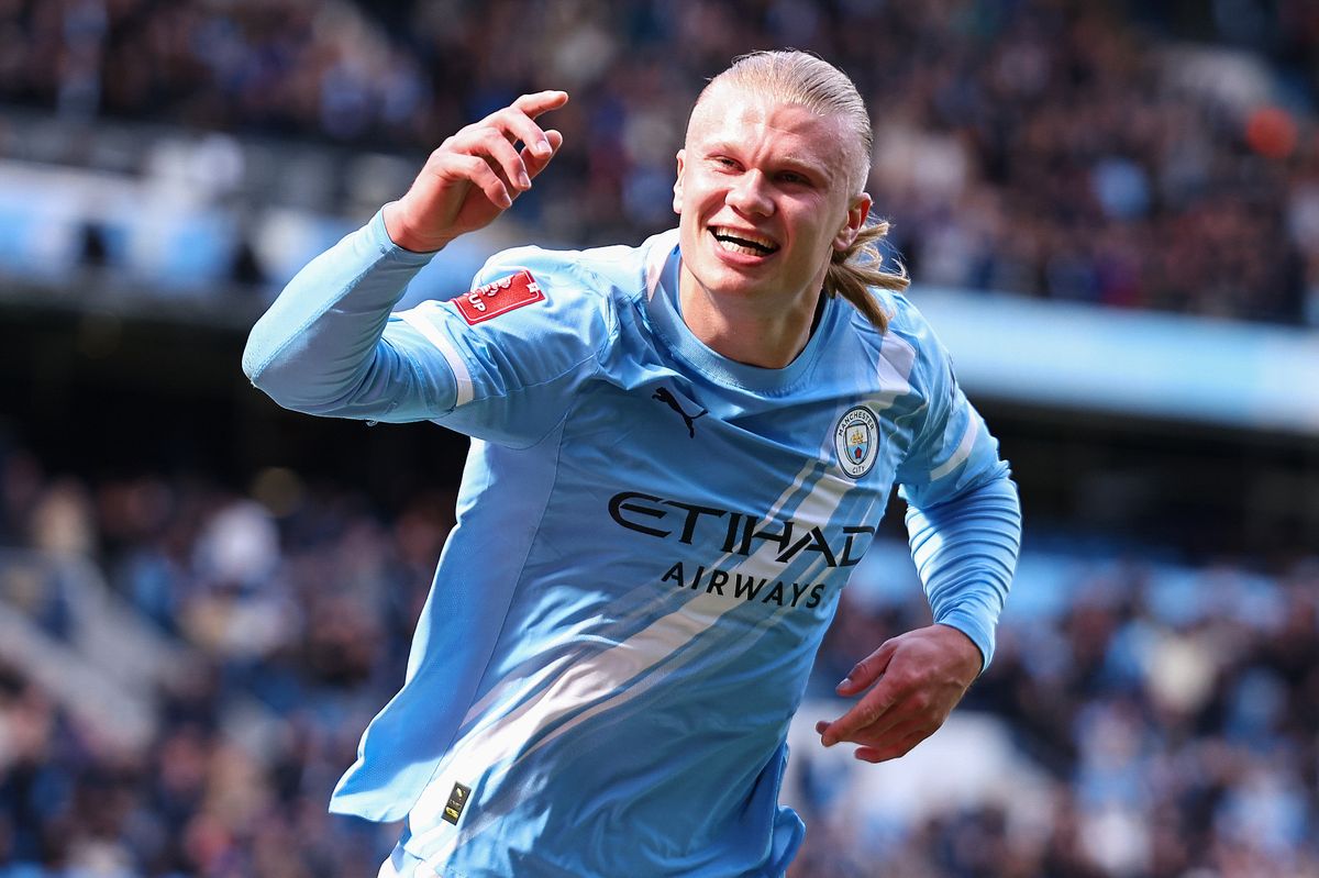 Erling Haaland celebrates after scoring a goal for Manchester City against Liverpool