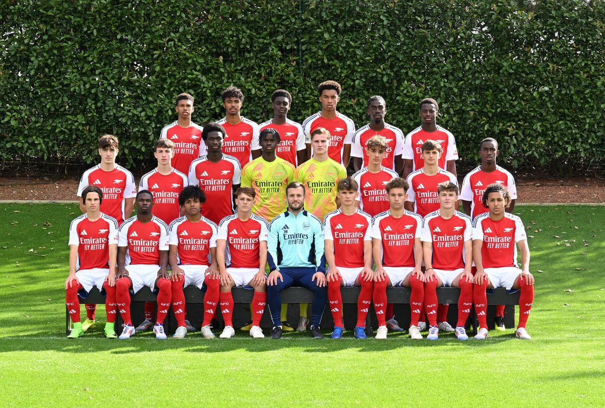 Back row (L-R) Andre Harriman-Annous, Max Kuczynski, Ife Ibrahim, Zacariah Shuaib, Josh Ogunnaike, Bless Akolbire. Middle row (L-R) Louie Copley, Dan Casey, Samuel Onyekachukwu, Khari Ranson, Jack Porter, Max Dowman, Sam Chapman, Reece Clairmont. Front Row (L-R) Alex Marciniak, Jakai Fisher, Luis Zecevic John, Theo Julienne, Jack Wilshere (Head Coach), William Sweet, Brayden Clarke, Ceadach O'Neill and Cam'ron Ismail during the Arsenal Academy U21 & U18 photocall at Sobha Realty Training Centre on September 24, 2024 in London Colney, England. 
