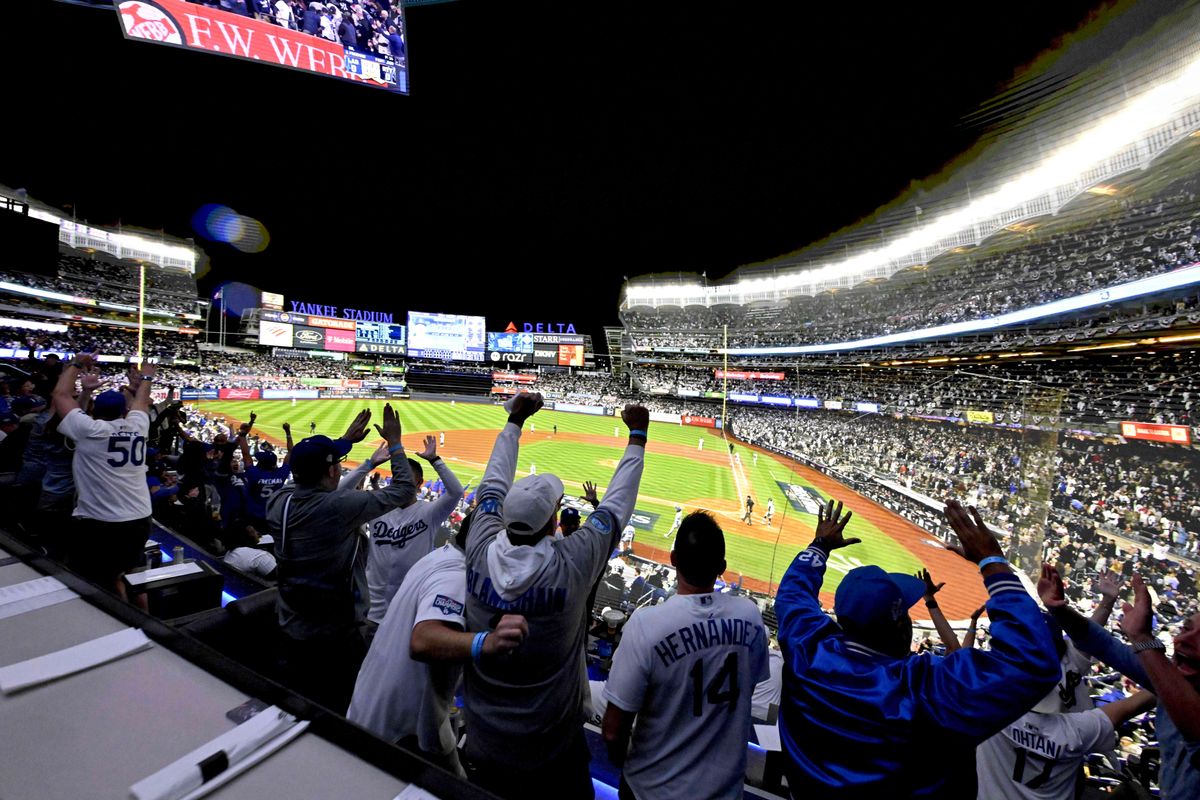 Inglewood, CA - October 29:  Dodgers fans cheer after Freddie Freeman of the Los Angeles Dodgers hits two run home run against the New York Yankees in the first inning of Game 4 2024 World Series between the New York Yankees and the Los Angeles Dodgers during a watch party at Cosm Los Angeles in Inglewood on Tuesday, October 29, 2024.(Photo by Keith Birmingham/MediaNews Group/Pasadena Star-News via Getty Images)