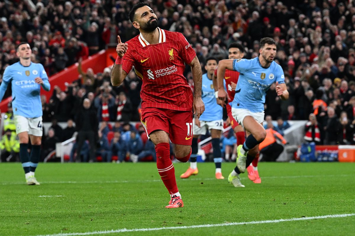 Mohamed Salah of Liverpool celebrating after scoring the second goal during the Premier League match between Liverpool FC and Manchester City FC at Anfield on December 01, 2024 in Liverpool, England.