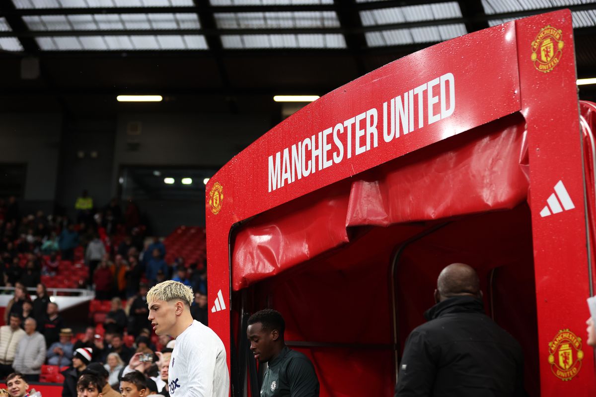Alejandro Garnacho of Chelsea enters the pitch to warm up prior to the Premier League match between Manchester United and Chelsea at Old Trafford on September 20, 2025 in Manchester, England. 