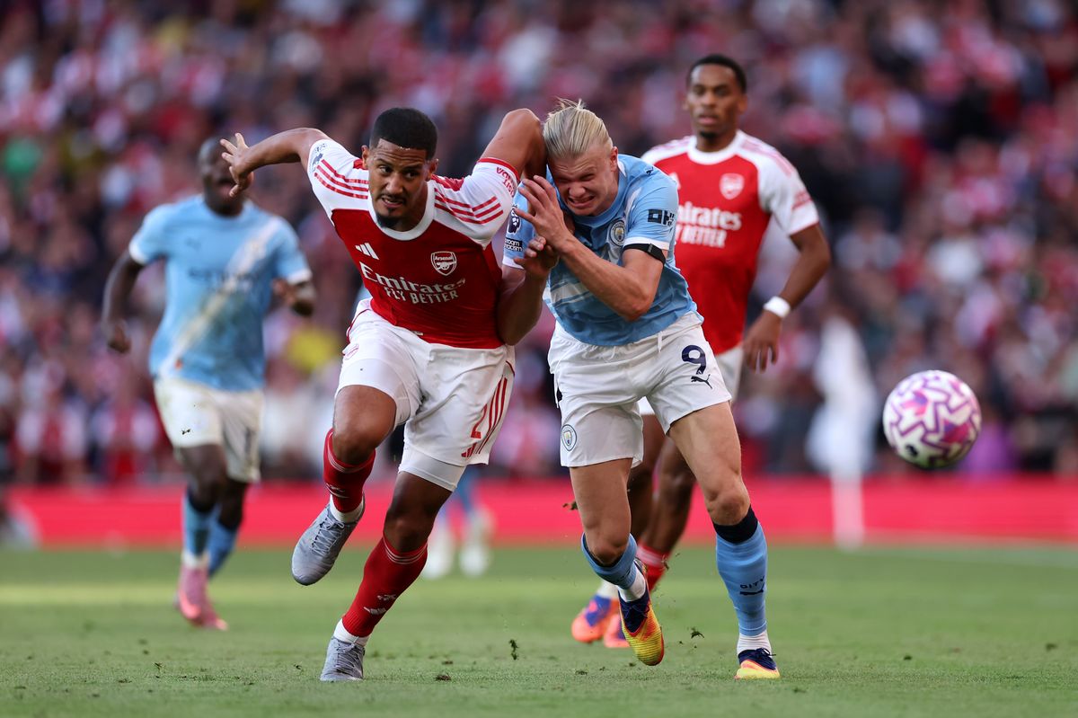 LONDON, ENGLAND - SEPTEMBER 21: William Saliba of Arsenal battles for possession with Erling Haaland of Manchester City during the Premier League match between Arsenal and Manchester City at Emirates Stadium on September 21, 2025 in London, England. (Photo by Justin Setterfield/Getty Images)