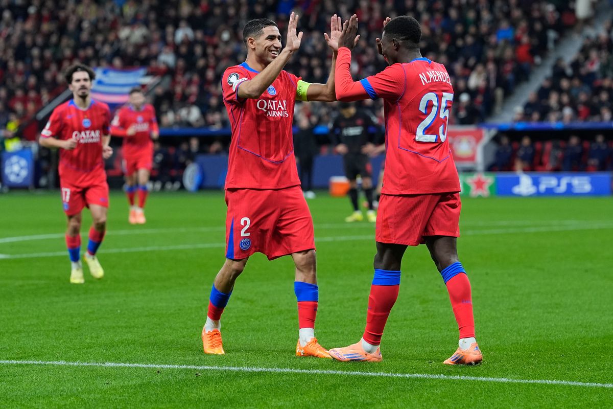 Achraf Hakimi celebrating with Nuno Mendes
