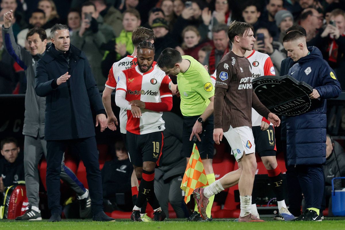 Raheem Sterling of Feyenoord makes his debut, coach Robin van Persie of Feyenoord, assistant referee Rens Bluemink, referee Niels Boel  during the Dutch Eredivisie  match between Feyenoord v Telstar