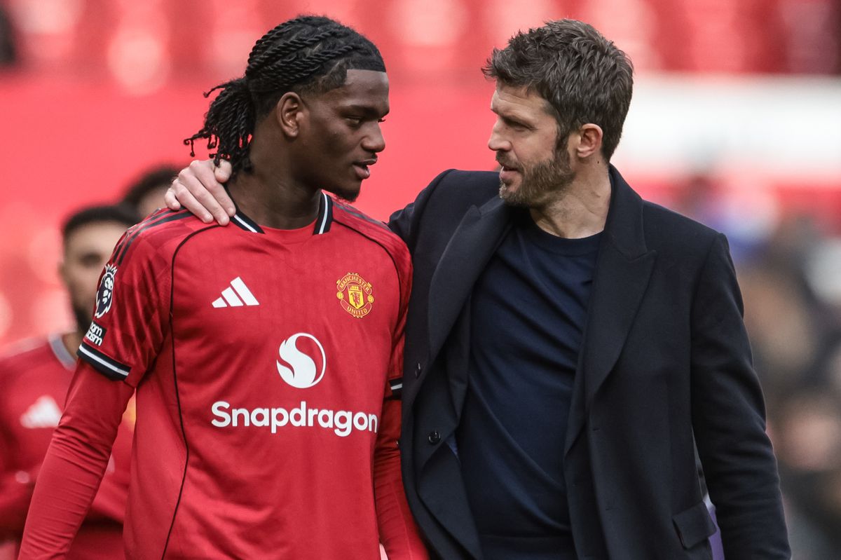 Michael Carrick, manager of Manchester United, speaks with Ayden Heaven of Manchester United during the Premier League match between Manchester United and Crystal Palace at Old Trafford in Manchester, United Kingdom, on March 1, 2026. (Photo by Mark Cosgrove/News Images/NurPhoto via Getty Images)