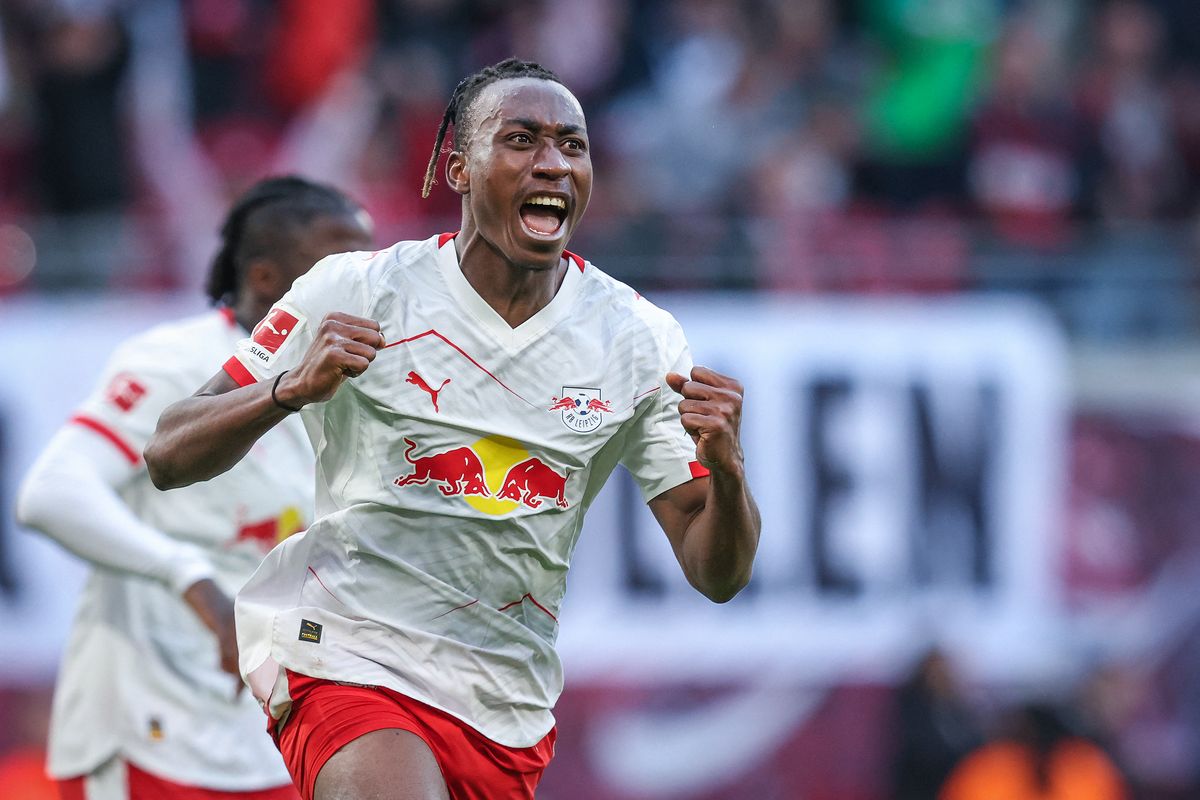Leipzig's Ivorian forward #49 Yan Diomande celebrates after scoring the 1-1 goal during the Bundesliga football match between RB Leipzig and Augsburg in Leipzig, eastern Germany, on March 7, 2026. (Photo by Ronny HARTMANN/AFP via Getty Images)/DFL REGULATIONS PROHIBIT ANY USE OF PHOTOGRAPHS AS IMAGE SEQUENCES AND/OR QUASI-VIDEO