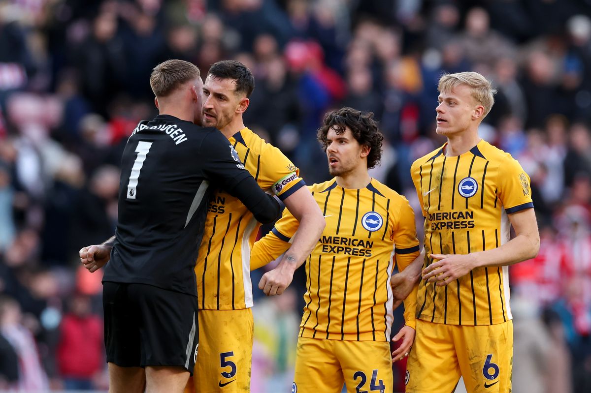 Brighton & Hove Albion's Bart Verbruggen celebrates with team-mates