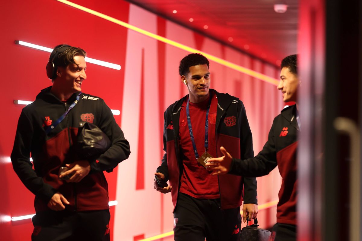 Jarell Quansah of Bayer 04 Leverkusen arrives at the stadium with teammates prior to the UEFA Champions League 2025/26 Round of 16 Second Leg match between Arsenal FC and Bayer 04 Leverkusen at Arsenal Stadium