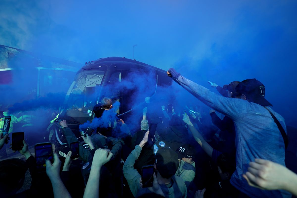 The Everton team bus arrives as fans set off smoke flares outside the stadium prior to the Premier League match between Everton and Chelsea at Hill Dickinson Stadium. Photo by Alex Livesey/Getty Images