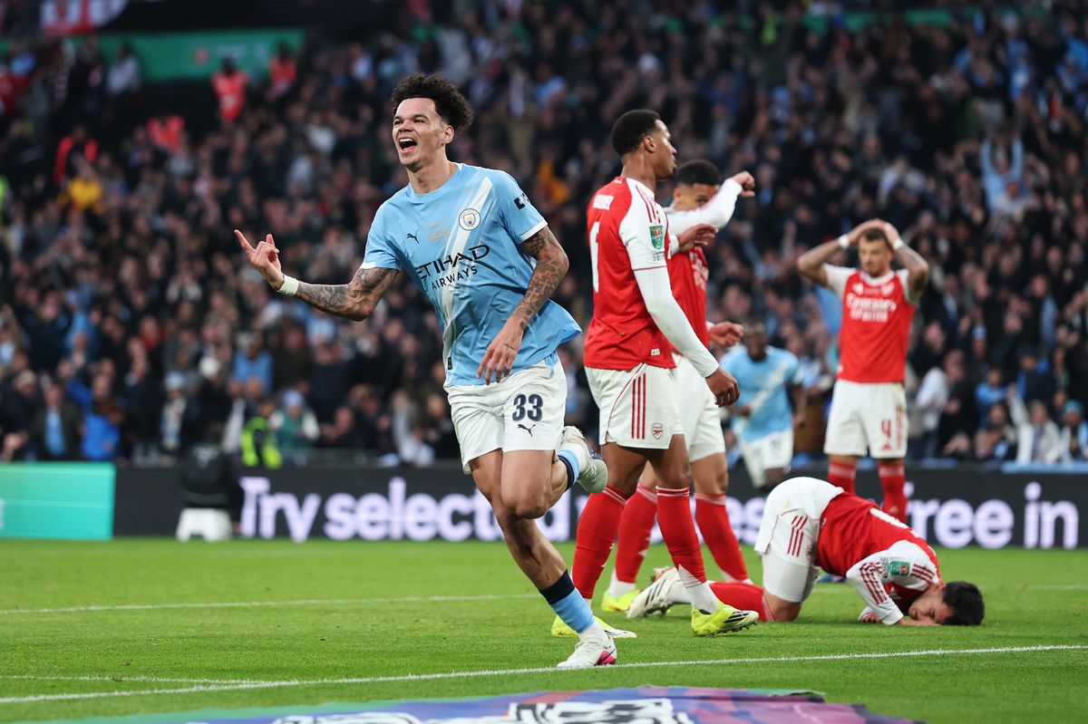 Nico O'Reilly of Manchester City celebrates scoring his team's first goal during the Carabao Cup Final match between Arsenal and Manchester City at Wembley Stadium 