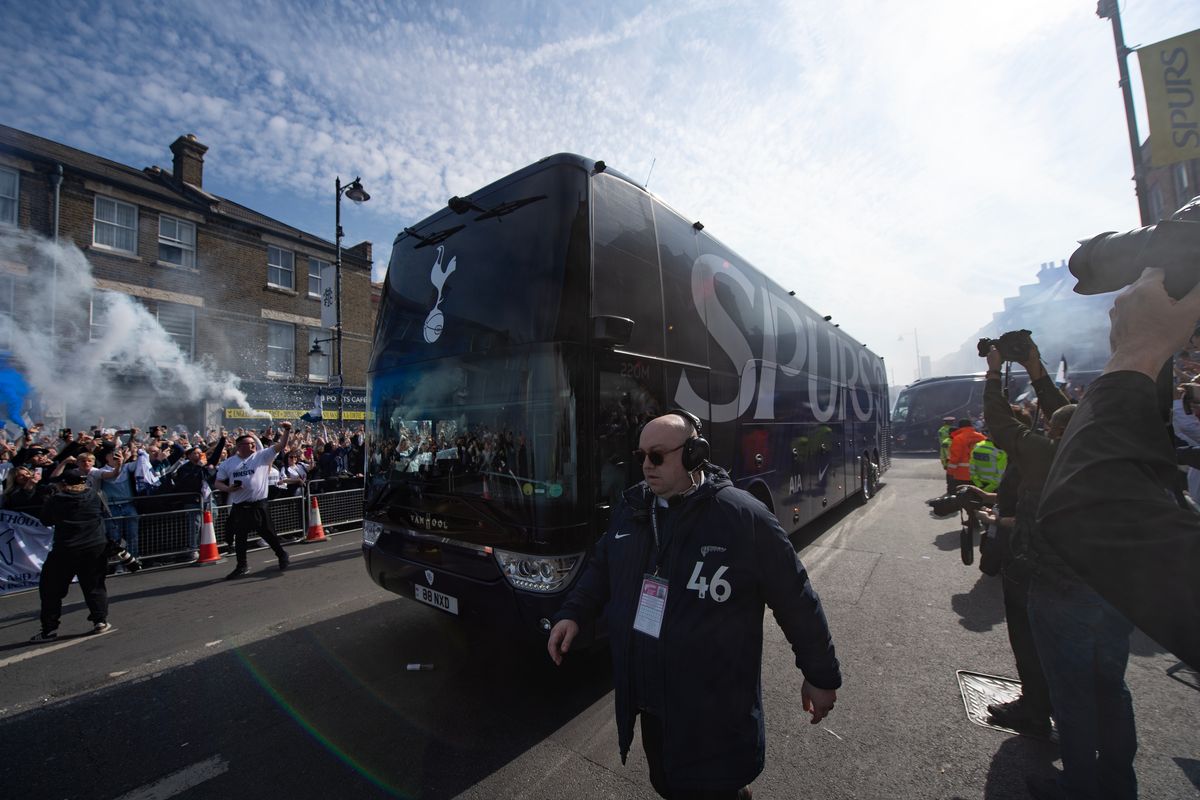 Tottenham fans greet the team coach