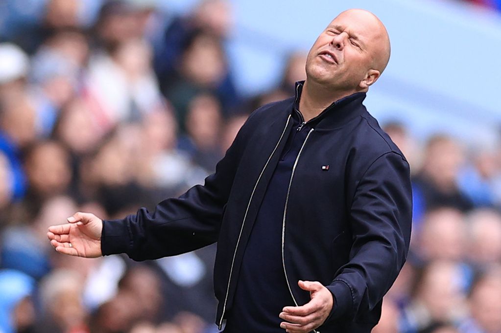 Liverpool manager Arne Slot looks dejected during the Emirates FA Cup Quarter Final match between Manchester City and Liverpool at Etihad Stadium on April 4, 2026 in Manchester, England